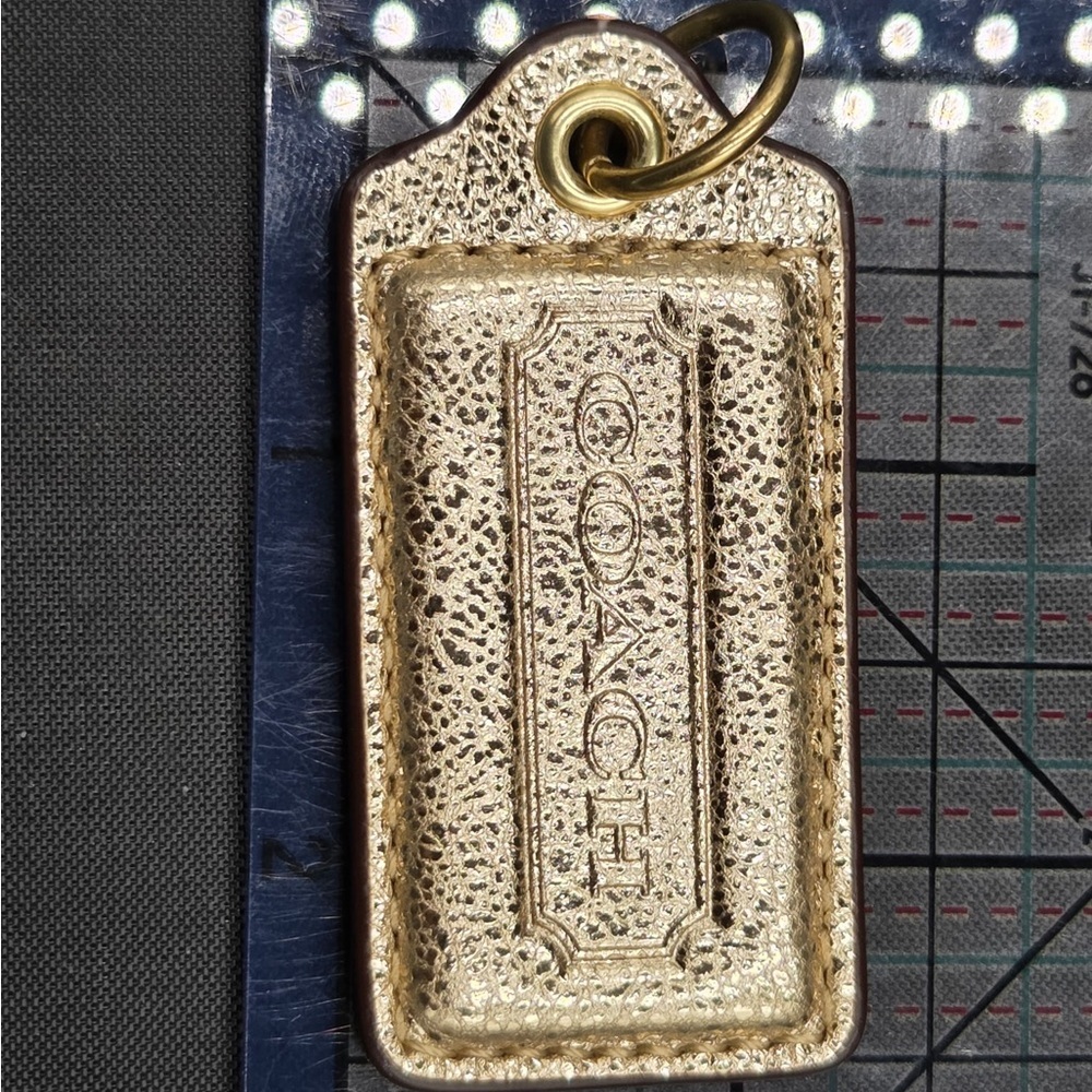 Coach Metallic Gold Tag